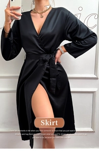 Detail of elegant black satin bathrobe with waist tie and sexy high side slit design