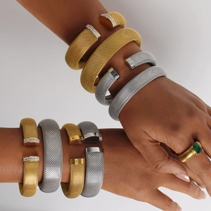 Mesh open cuff bracelets in gold and silver finish with rhinestone accents for women