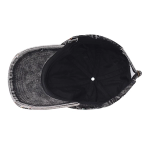 Detail of distressed denim baseball cap showing inner lining and adjustable metal buckle