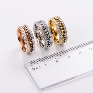 Three-piece twist knot ring set with rhinestones in rose gold, silver, and gold finish