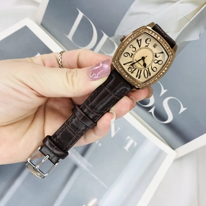 Vintage square gold watch with diamond bezel, brown leather strap and date display