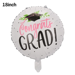 Detailed view of an 18-inch white foil balloon with Congrats GRAD print and mortarboard