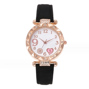 Montre à quartz pour femme en or rose avec lunette sertie et motif de cœur rose au cadran