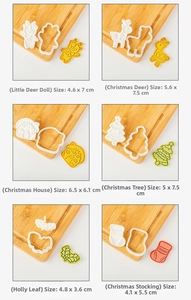 Detailed view of Christmas cookie cutters showing Santa, reindeer, and tree shapes