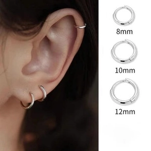 Three sizes of silver minimalist hoop earrings 8mm 10mm 12mm shown on model and flat lay