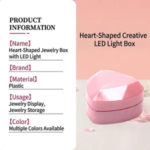 Pink heart-shaped LED jewelry box with elegant diamond-cut finish for rings and necklaces