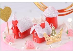 Detailed Christmas snow house cake topper set with gold crown and strawberry accents