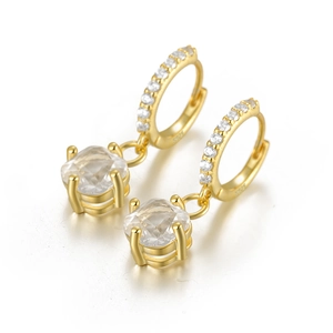 Detail of S925 sterling silver hoop earrings with square zircon and gold finish