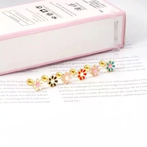 Detail of six colorful enamel daisy stud earrings with secure screw-back closures