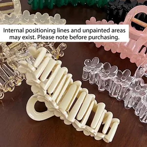 13cm floral acrylic hair claw clip set in assorted colors on a wooden surface