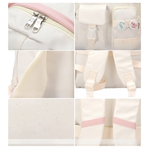 Detail view of smooth dual zippers, padded straps and waterproof nylon of the backpack