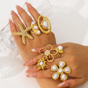 Gold-plated stainless steel ring set with starfish, flower designs and white pearls