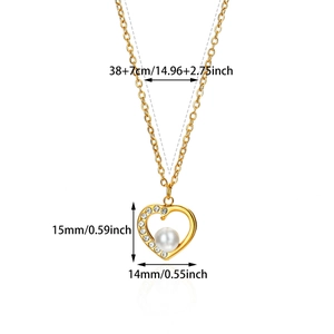 Detailed view of gold heart necklace with pearl and measurements in cm and inch