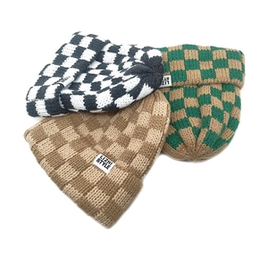 Checkboard knit beanie hats in black, green and brown with premium woven label