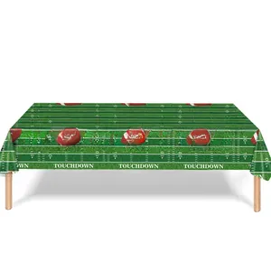Detail of football field tablecloth showing green grass texture and touchdown marking