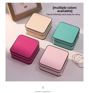 Detail view of multi-color portable mini jewelry cases for rings and necklaces travel storage