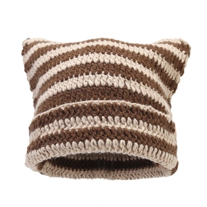 Handmade striped cat ear knit beanie in brown and beige colors for winter warmth