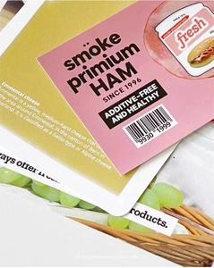 Detail of OAB scrapbooking stickers featuring food themes like ham and cheese