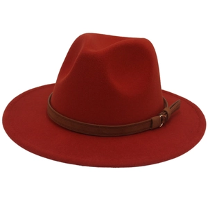 Detailed view of the red wool fedora crown with brown leather belt and gold buckle