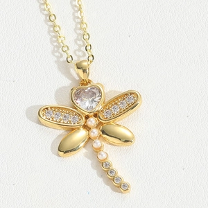 Detail of dragonfly pendant with heart zircon, micro-inlaid stones and elegant pearl