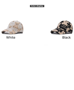 Detail display of cartoon bear print baseball caps in white and black cotton fabric