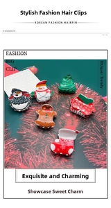 Macro shot of 6 festive acrylic Christmas hair claws including snowman and gingerbread man