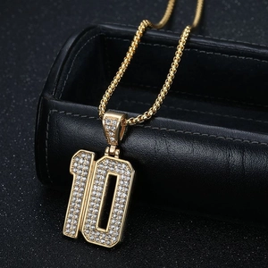Iced out gold number 10 pendant necklace with pavé zircons on twist rope chain
