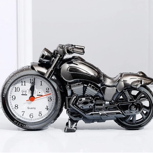 Unique motorcycle-shaped alarm clock with dark metallic chrome finish for home decor