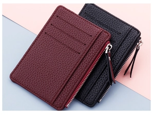 Slim card wallet detail in wine red and black lychee texture with zipper compartment