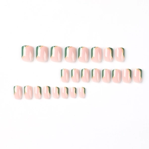 French style short square press-on nails set with green and gold accents on pink base