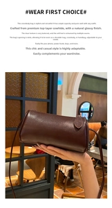 Brown leather cylindrical shoulder bag, stylish crossbody bag with delicate texture for women.