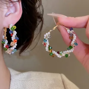 Colorful crystal pearl hoop earrings with gold wire wrap for a bohemian luxury look