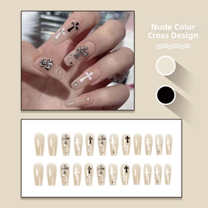 Long coffin press-on nails in nude with black, white and silver 3D metal crosses