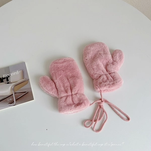 Detailed texture of plush lotus pink mittens with matching anti-lost neck strap cord