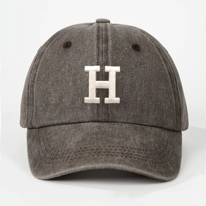 Vintage washed dark gray baseball cap with white embroidered H letter on front view