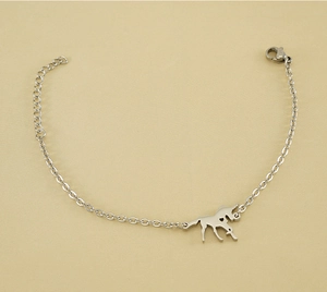 Detail view of silver unicorn pendant bracelet with adjustable extender and lobster clasp