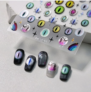 Macro detail of M-728 3D cat eye effect nail stickers with mystical pupil designs