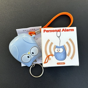 Blue owl personal safety alarm with 130dB sound, keychain, and instructions on leather