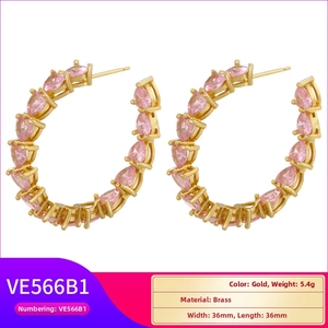 Detail showing 36x36mm pink heart-shaped C-shaped earrings with 18K gold plating