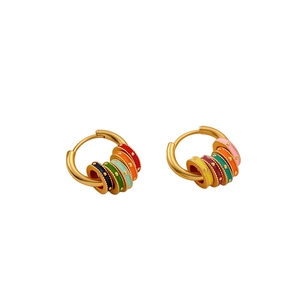 Matte gold hoop earrings with colorful enamel charms and small beaded detailing