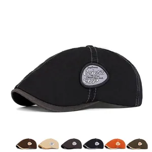 Classic cotton flat cap with vintage embroidery patch shown in seven diverse colors