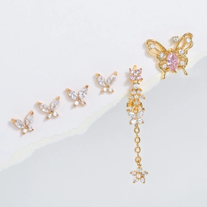 S925 silver needle butterfly tassel earrings set with gold frame and pink zircon