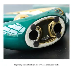 Detail of high-temperature ceramic base with four black non-slip pads for surface protection
