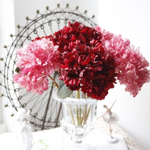 Close-up of vintage artificial hydrangea in oil painting red and pink colors