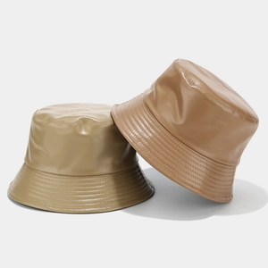 Minimalist double-sided PU leather bucket hats in khaki and latte for sun protection