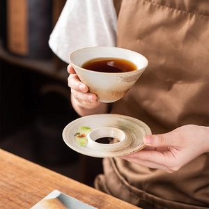 Japanese style retro ceramic coffee cup and saucer set with a rustic mottled glaze finish