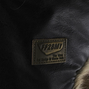 Winter leather trapper hat with premium faux fur lining and embossed vintage side patch