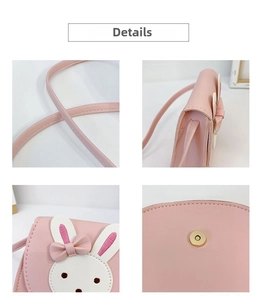 Close-up of pink rabbit crossbody bag featuring stitching details and golden magnetic buckle