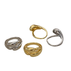 Minimalist double-layered metallic fluid rings in gold and silver finish set of four
