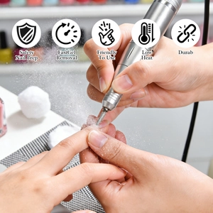Close-up of silver electric nail drill prep with safety icons and dust detail